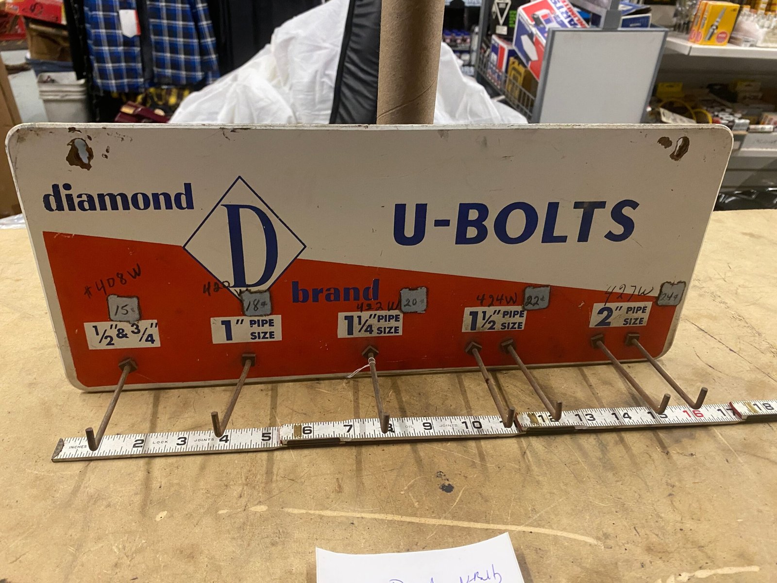 19e6532b-4ecb-40b0-ab3b-ec2412e2cd04-scaled-1.jpg Vintage Diamond Display Sign Rack Hardware Store Advertising Auto Parts General