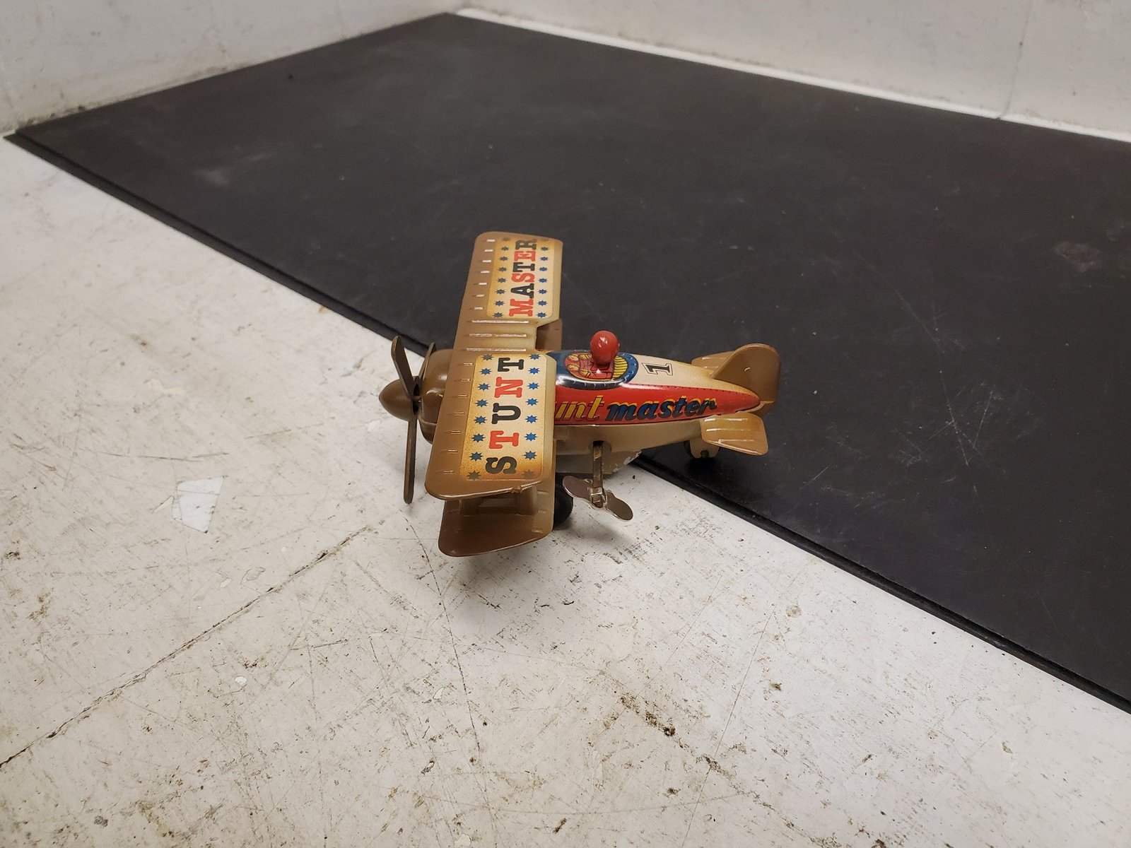 20210320134608a.jpg Vintage Antique Stunt Master 1 wind up toy airplane plastic metal made in China