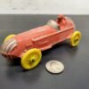 20210909105730a_d66d9e2b-8ec6-4fef-a4c4-0317d3e93a32.jpg Vtg Auburn Rubber Corp. Auburn, Indiana Made in USA # 536 Red Racecar w/Driver