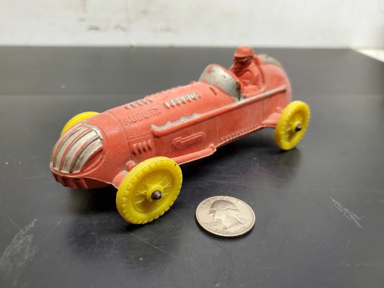 20210909105730a_d66d9e2b-8ec6-4fef-a4c4-0317d3e93a32.jpg Vtg Auburn Rubber Corp. Auburn, Indiana Made in USA # 536 Red Racecar w/Driver