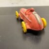 20210909105743a_38cf37e0-4c08-475d-8779-5f2dc4df54c6.jpg Vtg Auburn Rubber Corp. Auburn, Indiana Made in USA # 536 Red Racecar w/Driver