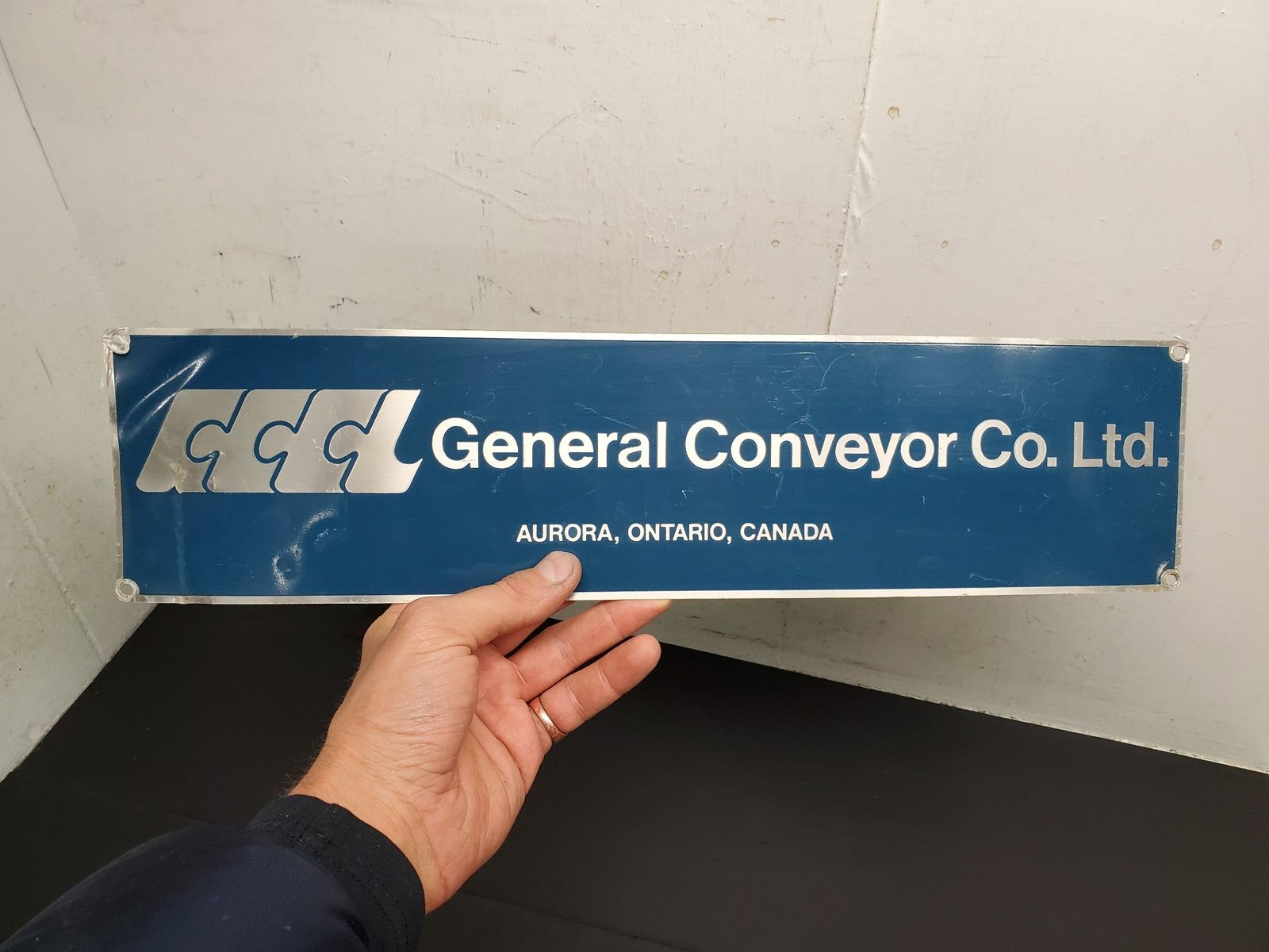 Vtg General Conveyor Co. Ltd. Aurora, Ontario, Canada Dark Blue/Silver Sign