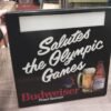 Plastic Budweiser Beer Sign 1984 Olympic Games Advertisement Breweriana 17x17