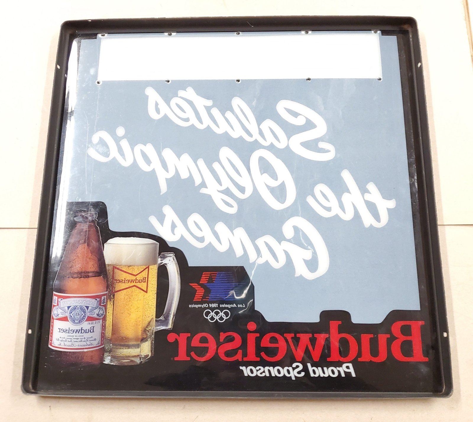20260313_104209-scaled-1.jpg Plastic Bud Light Beer Sign 1984 Olympic Games Advertisement Breweriana 18" x 18