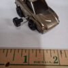 49ca845b-91f2-4265-b0e3-fc16f71f2912-scaled-1.jpg Vintage Knickerbocker 1979 Datsun 240Z Wind Up Car Chrome Works Rubber Rear Tire