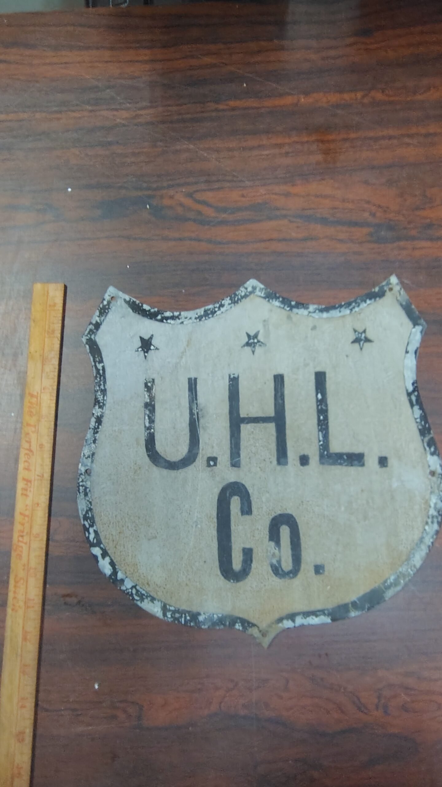 96862557-ca40-4a84-aad4-2de04e18e783-scaled-1.jpg Antique UHL Co. Metal Shield Sign Industrial Advertising Highway Marker Vtg tin!
