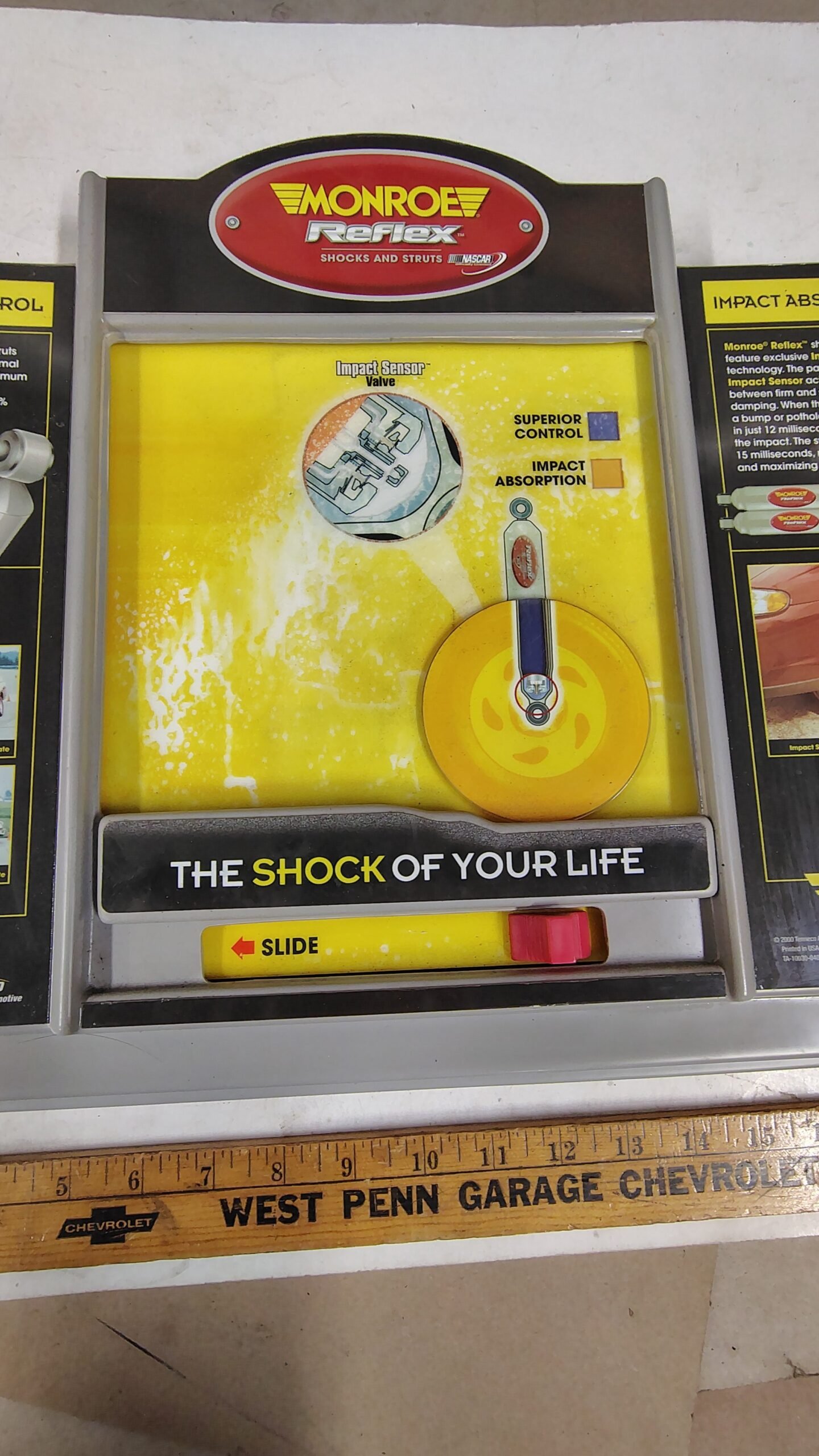 9a3c80d8-c5d0-4dbe-9bf2-a673a0519fc1-scaled-1.jpg Vintage 2000 Monroe Reflex Shocks Struts Interactive Counter Display Sign NASCAR