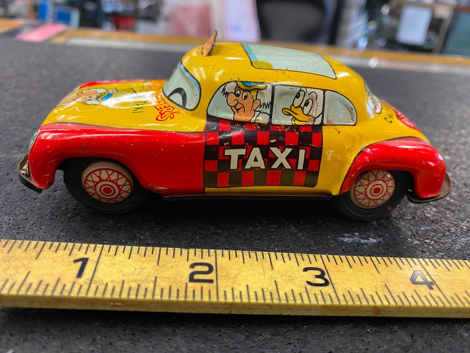 Vintage Walt Disney Products Friction Mad Hatters Sky View Taxi Cab Tin Toy Car!
