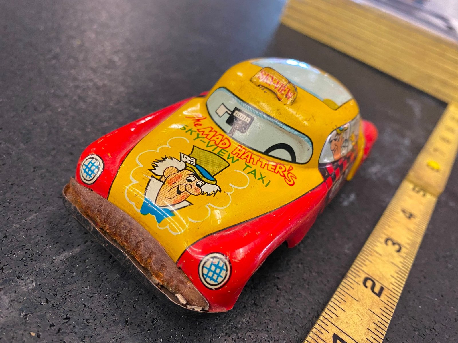 Vintage Walt Disney Products Friction Mad Hatters Sky View Taxi Cab Tin Toy Car!