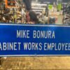 img6032_841efe2f-5f2f-4c15-a70e-92c335428672.jpg Vtg Sign Bonura Cabinet Works Pgh Pa Road Sign 48x18 alum Road Advertising Cave